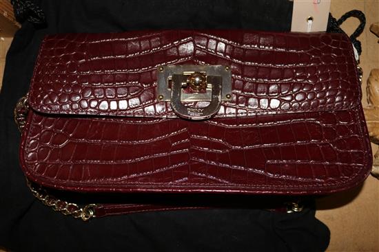DKNY maroon crocodile-stamped leather handbag with DKNY outer cloth bag